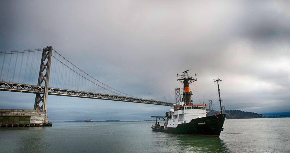The Oceanus passes under the Bay Bridge as it docks in San Francisco. (Credit: Kelly J. Owen/Berkeley Lab)
